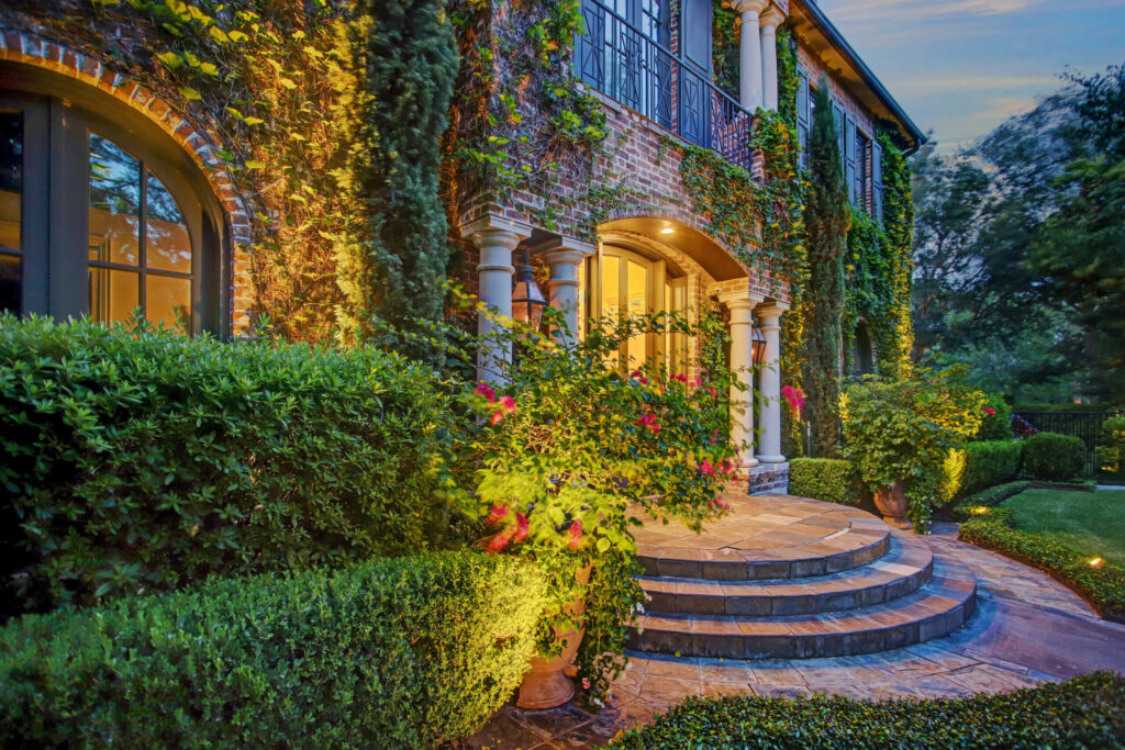 Beautiful landscape lighting to enhance your entry and curb appeal.